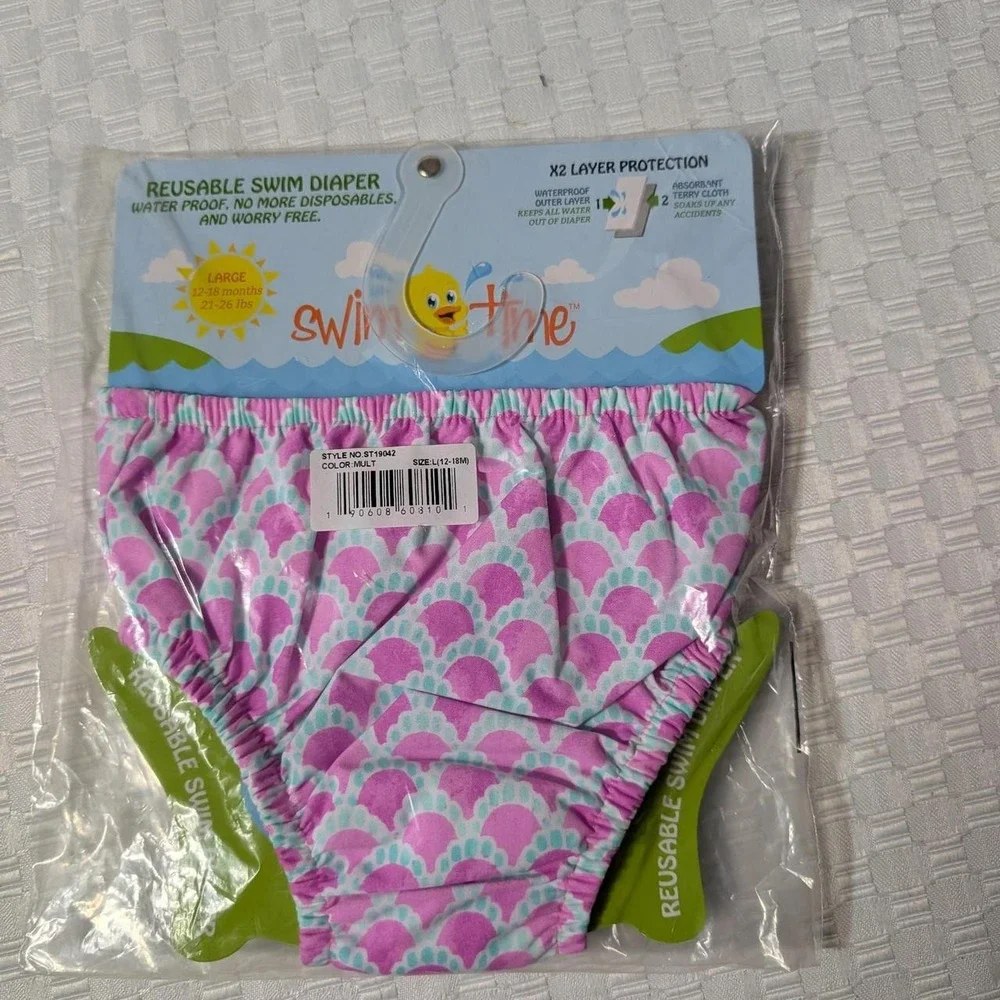 Swimtime reusable swim diaper with pink and light blue mermaid scale pattern